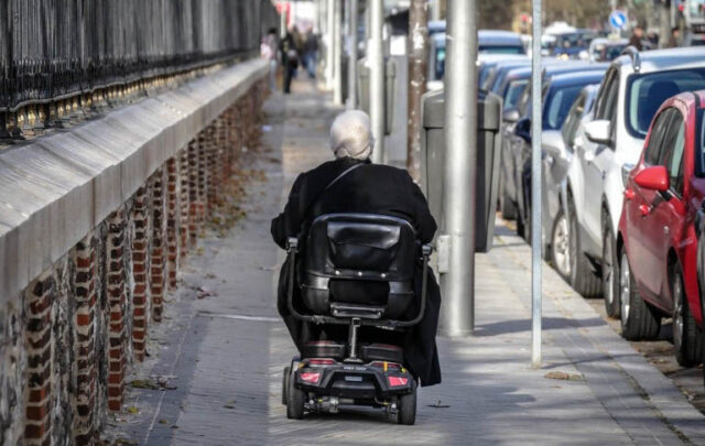 Woman in mobility wheelchair